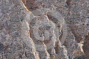 Texture of natural rock granite natural rock granite, magmatic structure with quartz and mica and traces of erosion