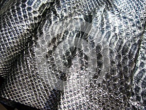 The texture of natural skin of a python, a snake.