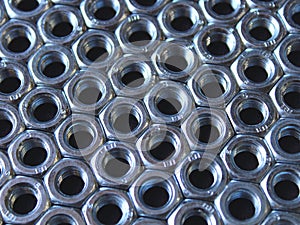 Texture nuts and bolds on a black background