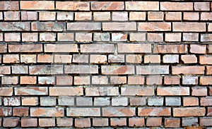 Texture of old brick wall without  mortar in gaps between bricks