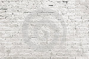 Texture of old brick wall sprayed with stucco mortar as background