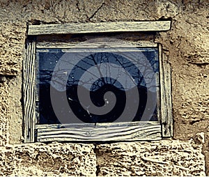 Texture from old coquina limestone with window. Rustic window of an old barn, rural motif. Vector