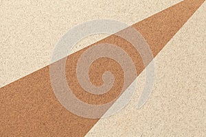 Texture of old craft beige and brown color paper background, macro. Structure of vintage abstract sand cardboard