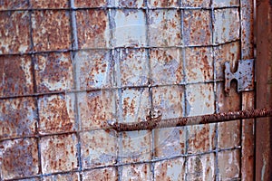 Texture of an old fence with faded and peeling paint