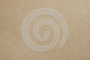 Texture of old organic cardboard, beige paper, background for design. Recyclable material