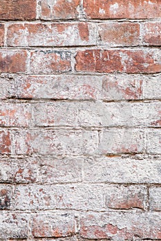 texture of old red brick wall on an abandoned building