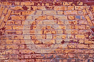 texture of an old red and yellow brick wall. Close-up, pattern