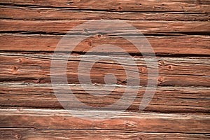 The texture of old rough logs.