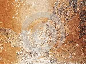 Texture of old rustic wall covered with brown stucco