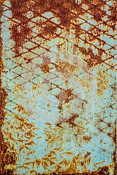 Texture of rusty metal, painted white which became orange from rust. Vertical texture of rusty pattern on paint in form of steel