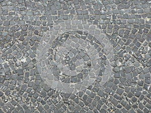 Texture of an old stone road, top view