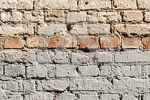 Texture of the old wall of brick blocks, scattered brick and brickwork, architecture abstract background