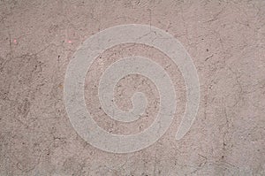 Texture of old wall covered with gray stucco