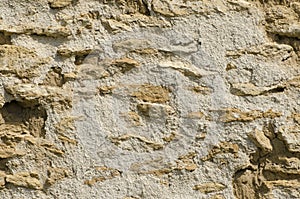 The texture of the old wall of natural stone