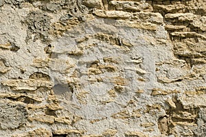 The texture of the old wall of natural stone