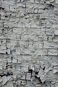 Texture of an old wall, which was pasted with newspaper clippings