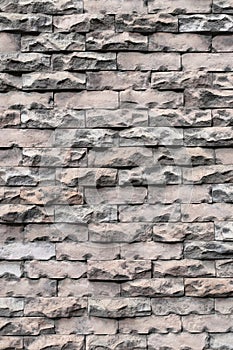 Texture of old weathered brick wall decayed and broken malfunctioning degraded.