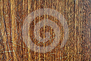 Texture of an old wooden beige table covered with a layer of cracked lacquer