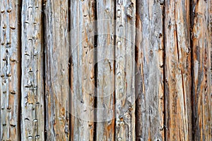 Texture of an old wooden wall as a background.