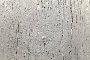 Texture of old wooden wall with cracking white paint