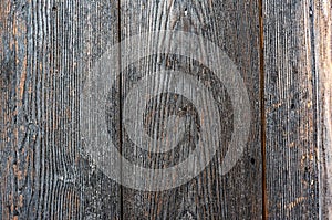 Texture of old wooden wet planks. Old vintage aged grunge dark brown and gray wooden floor planks