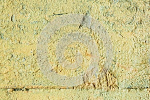 The texture of the old yellow boiled wall