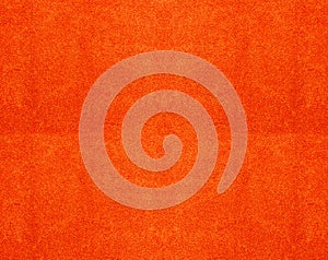 Texture of a orange cotton towel