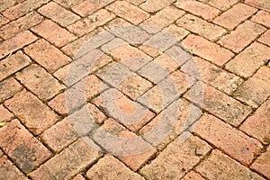 Texture orange old blick tile floor of sidewalk for background