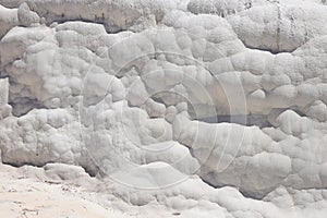 Texture of Pamukkale famous blue travertine pools and terraces
