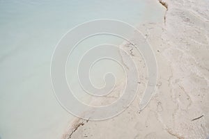 Texture of Pamukkale famous blue travertine pools and terraces