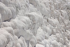 Texture of Pamukkale famous blue travertine pools and terraces