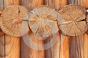 Texture parallel folded treated timber. Ancient technology building of Russian log hut, wood house cottages and churches