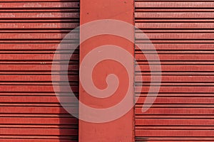 texture pattern of iron door of closed store and rough wall