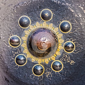 Texture and pattern of large old nipple gong at Buddhist temple