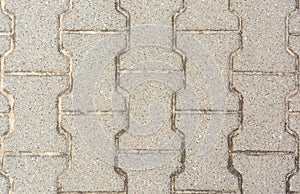 The texture of the pavement, road pavers