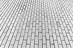 Texture of a paving stone road. Abstract background for design