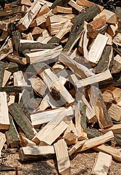 The texture of a pile of chopped firewood for the furnace firebox. Agriculture