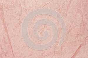 Texture of pink background of wavy corrugated paper