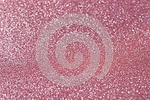 Texture of pink holographic sparkles, close up, bright colorful texture, close up