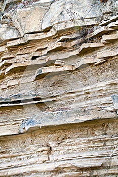 Texture of prehistorical alluvial layers solidified into sandstone