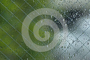 Texture of rain drops on glass window