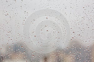 Texture of raindrops on wet glass