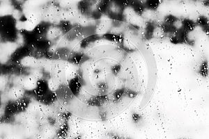 Texture Raindrops on window glass for rain, black and white colors, photo, unusual background