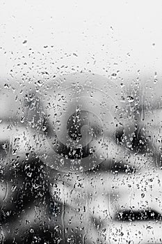 Texture Raindrops on window glass for rain, black and white colors, photo, unusual background