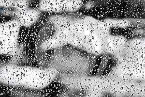 Texture Raindrops on window glass for rain, black and white colors, photo, unusual background