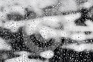 Texture Raindrops on window glass for rain, black and white colors, photo, unusual background