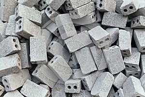 Texture of random concrete bricks with two holes that ready for making wall at Sa Pa, Vietnam