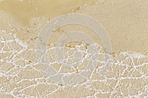 Texture of raw salt on sea water in evaporation ponds process at