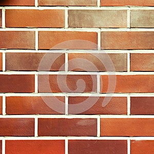 Texture red brick wall. Background of ginger brickwork