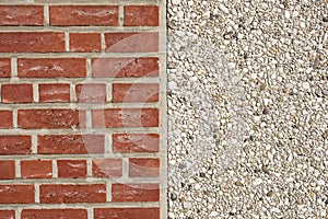 Texture of red brick wall and pebblestone